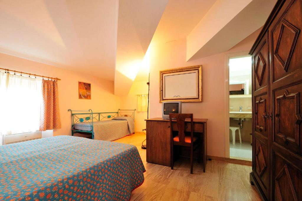 Hotel Villa Campana Кала Либерото Стая снимка